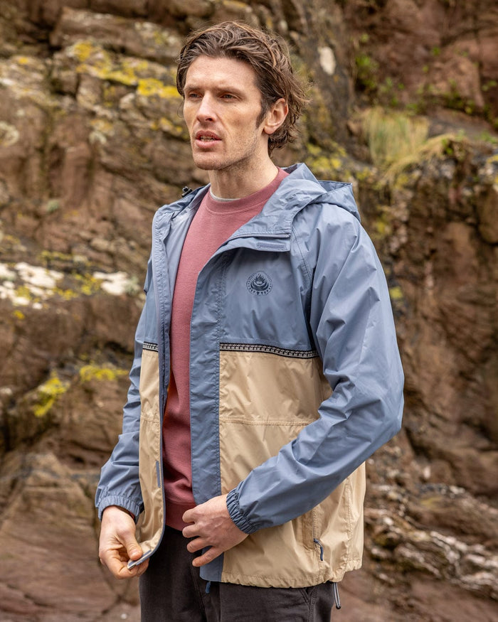 Rainer Tribal Mens Waterproof Packable Rain Jacket in Blue/Beige