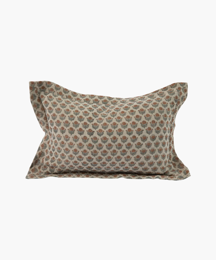A rectangular lumbar pillow with a floral pattern featuring small brown and blue flower motifs on a beige background, creating a cozy and vintage feel. | SW Home