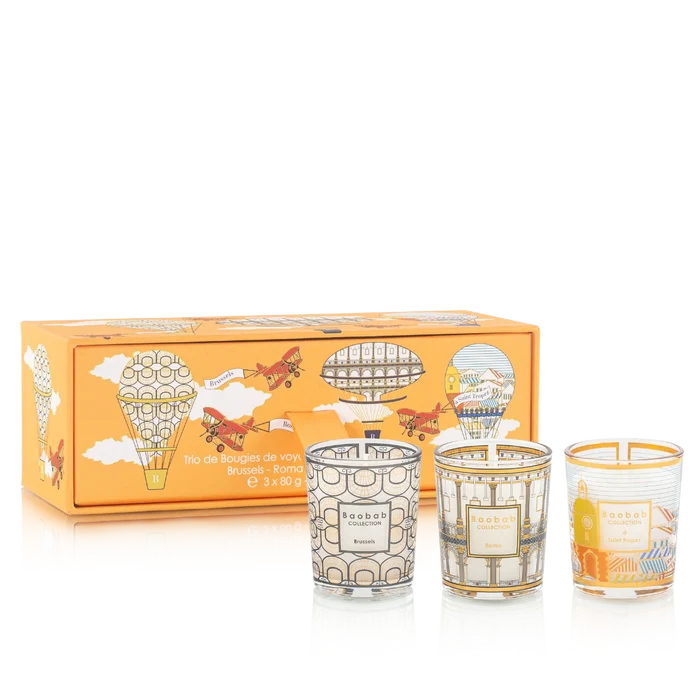 Three decorative candles with a matching box featuring airship and airplane designs on a white background.