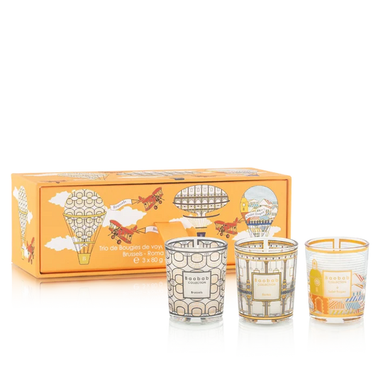 Three decorative candles with a matching box featuring airship and airplane designs on a white background.