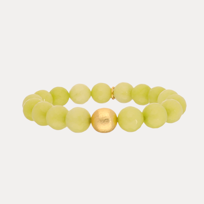 a bracelet with a gold bead