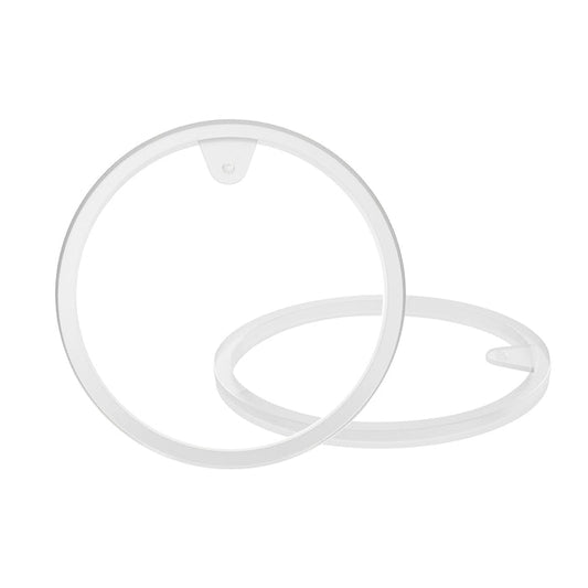 Two transparent, flat silicone rings overlap on a white background. The Thirsty Kids Silicone Gasket Replacement Part (2 Pack) fits Nuby Thirsty Kids cups, with each ring featuring a tab and notch for easy attachment.